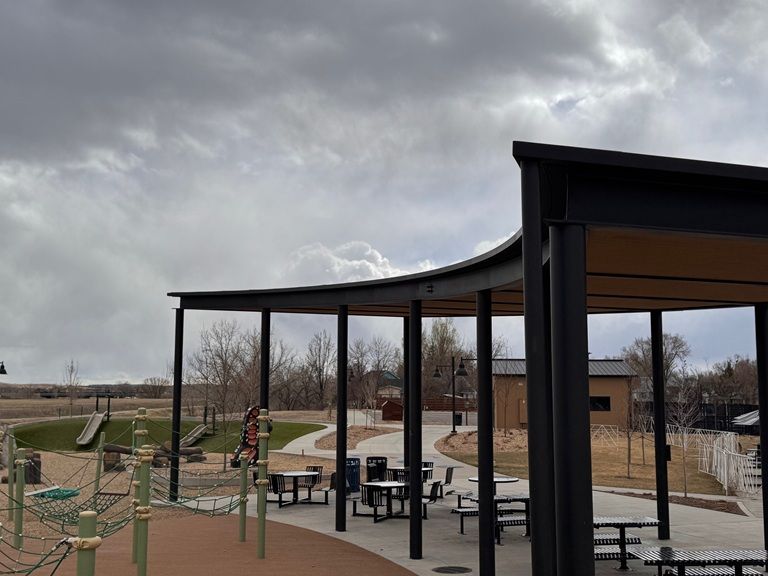 Outdoor curved steel park canopy complete playground alternate angle